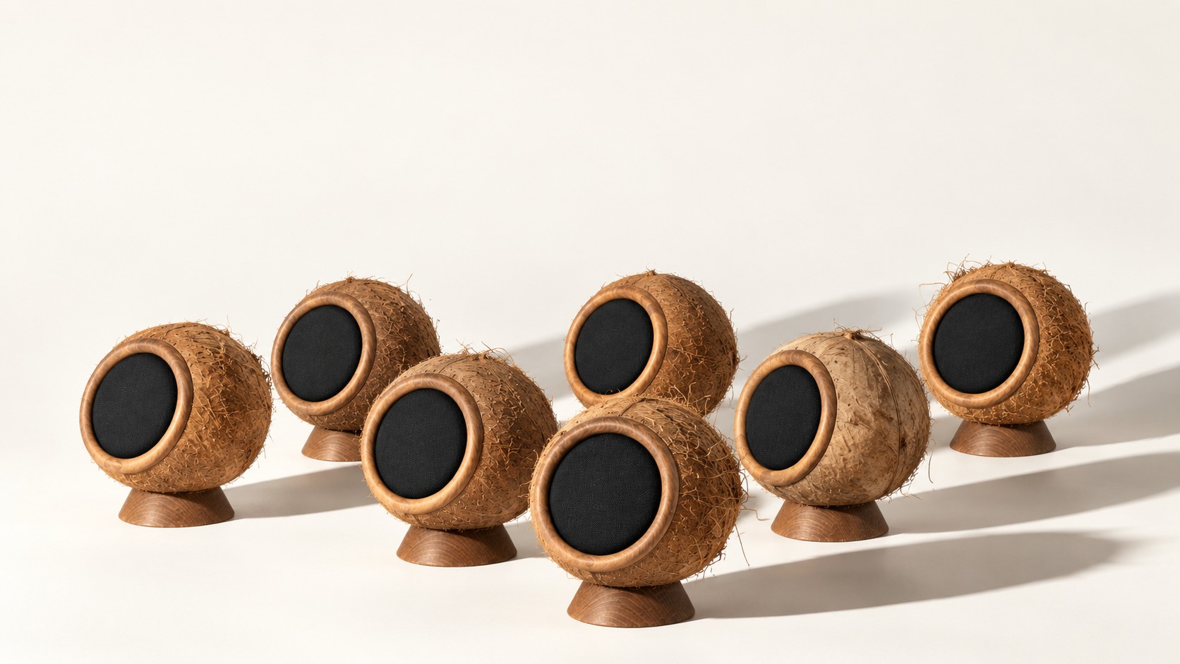 A group of Coconut objects, each with its own natural shell and wooden foot
