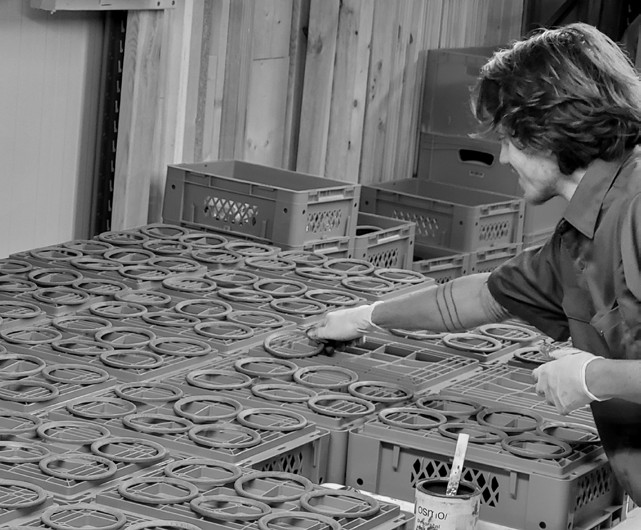 Wooden rings arranged in crates during production